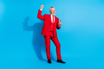 photo of carefree funky man hold champagne golden wine dance wear red tux shoes isolated blue color 