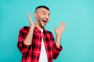 Sticker - Photo of amazed shocked man raise hands sale news good mood empty space isolated on teal color background