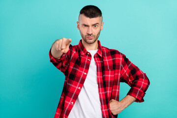 Sticker - Photo of unhappy sad angry young man point finger you blame choose isolated on teal color background