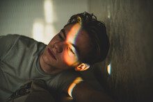 Man With Rainbow On Eyes Shadow And Smiley Nailpaint. LGBT Concept. Teenagers Problems, Sad Boy, Skin Problem.