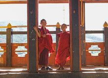 Bhutan, Paro, Young Buddhist Monk Novices (6-7, 10-11) In Buddhist Temple