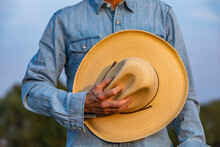 Senior Man Holding Cowboy Hat