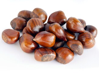 Wall Mural - brown edible nuts of Castanata sativa 