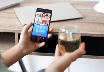 Canvas Print - Young man celebrating Birthday online at home due to Coronavirus epidemic