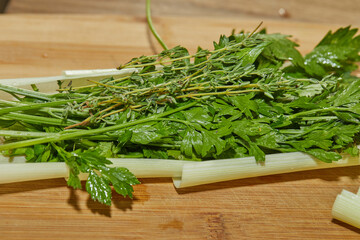 Sticker - Chef prepares bouquet of herbs and herbs in the kitchen for dressing the dish