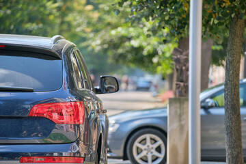 Wall Mural - Close up of a car parked illegally against traffic rules on pedestrian city street side