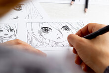 An Artist Draws A Storyboard Of An Anime Comics Book. Manga Style.