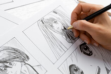 An Artist Draws A Storyboard Of An Anime Comics Book. Manga Style.