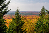 Fototapeta Na ścianę - View on the mountains and the fall foliage of Mont Megantic National park from a belvedere along the 