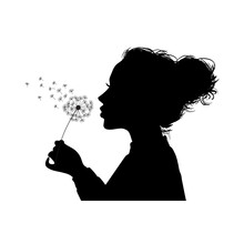 Silhouette Of A Young Girl Blowing Dandelion