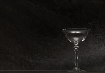 Wall Mural - Drink glassware in dark tile background