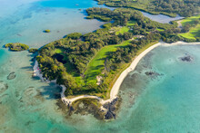 Aerial View Of Ile Aux Cerfs With A Golf Club, A Beautiful Island Along The Coast Near The Reef, Mauritius.