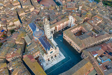 Aerial View Of Duomo Di Siena, The Romanesque Gothic Cathedral With Mosaic In Siena Downtown, Tuscany, Italy.