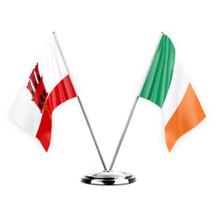 Two table flags isolated on white background 3d illustration, gibraltar and ireland