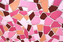 Modern Abstract Mosaic Background Pattern In A Bright Bold Palette Of Pink, Orange, Brown, Magenta, Ochre, White Glazed Tile Fragments Of Different Shapes And Sizes