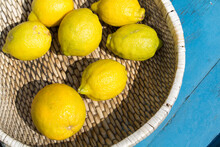 Fresh Lemons In A Basket