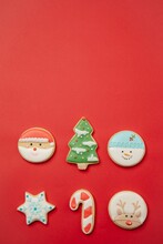Christmas Gingerbread Cookies On Red Textile