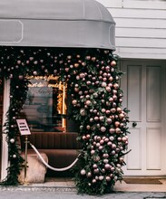 Restaurant Front Decorated With Christmas Baubles