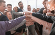 © ASDF - close up. young employees with a gesture of showing their unity