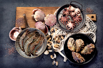 Poster - Fresh seafood arrangement on dark background.