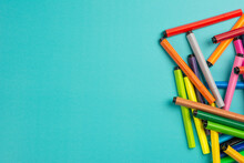 A Set Of Colored Markers. Office And School Supplies. Flat Lay Composition With Markers And Space For Text On Color Background. Colored Markers Isolated On Light Blue Background.