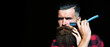 © Volodymyr - Beard man with black beard, bearded gay. Barber with razor on black, barbershop. Shaving in barber shop. Mustache men. Templates web banner design. Horizontal banner for hair salon.