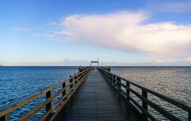  Binz pier with wooden bridge and two-tone water