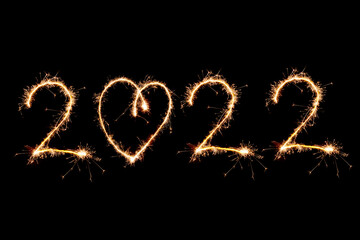 Wall Mural - 2022 written with Sparkle firework on black background, happy new year 2020 concept