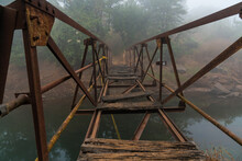 Broken Wooden And Metal Bridge