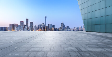 Panoramic skyline and modern commercial office buildings with empty square floors in Beijing