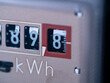 Close-up electricity meter. Measuring used electricity in kWh ( kilowatt hour )