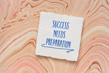 Wall Mural - Success needs preparation motivational note, handwriting on a handmade paper, business, education and personal development concept