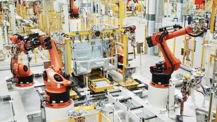 Wall Mural - Latest technology in machine production. Scene. Robotic machines working in production of cars and parts. New technologies and robotization in production