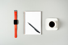 Notepad, Watch, Pen And A Cup Of Coffee Isolated On Light Gray Background. Notepad With Copy Space. Office, Business, Discreet Style.