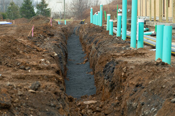 Wall Mural - Laying of cables and pipes in the trench water