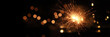 © Thaut Images - Happy New Year background with glowing sparklers.