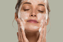Soap Face Woman Clean Skin Beauty. Color Background. Green