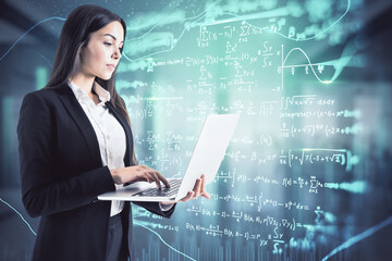 Canvas Print - Attractive young european businesswoman using laptop with abstract mathematical formulas hologram in blurry office interior. Science and education concept. Double exposure.