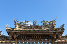 Double Dragons On The Roof Of Chinese Temple.