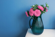 Still Life With Beautiful Asters In A Glass Vase
