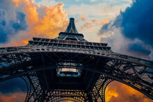View Of Eiffel Tower On Sunset Sky Background