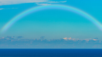 Canvas Print - Beautiful sea with a rainbow in the sky