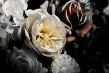 Fake Flowers Or Beautiful Textile Flowers On A Dark Background
