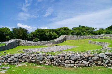 Wall Mural - The landscape of Nakijin castle ruins with blue sky in summer.