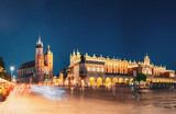 Fototapeta Na sufit - Krakow, Poland. Famous Landmarks On Old Town Square In Summer Evening. St. Mary's Basilica, Cloth Hall Building In Night Lighting. UNESCO World Heritage Site