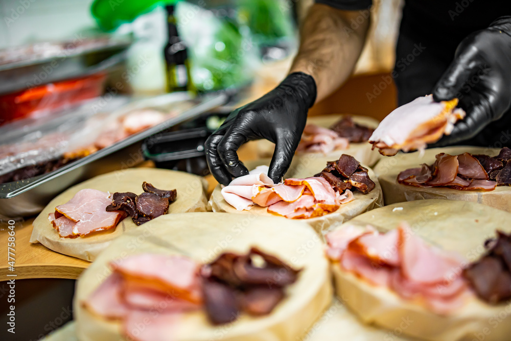 Chef hand is in process of Preparing catering food Stock Photo | Adobe ...