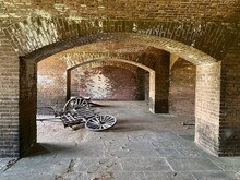 Cannon Artillery Cart In Fort Jefferson At Dry Tortugas National Park, Florida Keys. Gunrooms Known As Casemates, Form A Honeycomb Of Brick Masonry Arches.