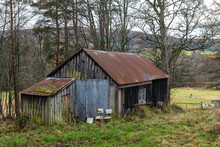 BALLINDALLOCH, MORAY, SCOTLAND - 30 DECEMBER 2021: This Is A A Very Old Wooden Building Used For Storage In Ballindalloch, Moray, Scotland On 30 December 2021..