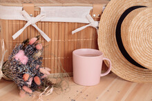 On Narrow Wooden Surface There Is Mug, Lavender Bouquet And Straw Hat. Provence. Aromatherapy. Home And Comfort. Lavender . Scents For Home.Summer Tea Party. Outdoor Recreation.