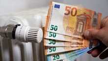 Europe, Italy , Increase In The Cost Of Bill For  Gas And Electricity Causes Increased Price For The Procurement Of Raw Materials, Money Euro Banknote And Domestic Heating Radiator